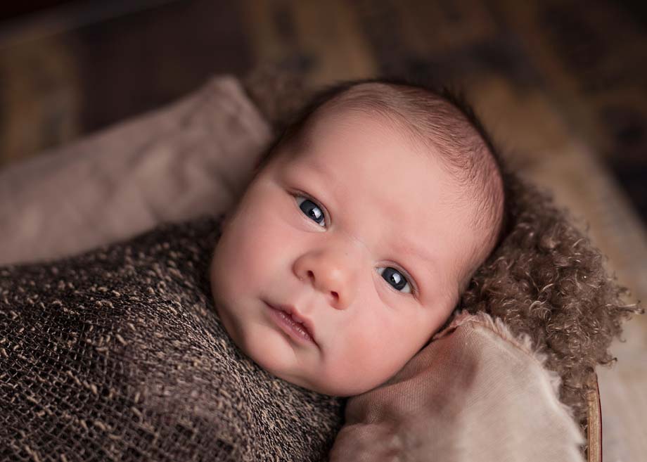 A baby looking inquisitively